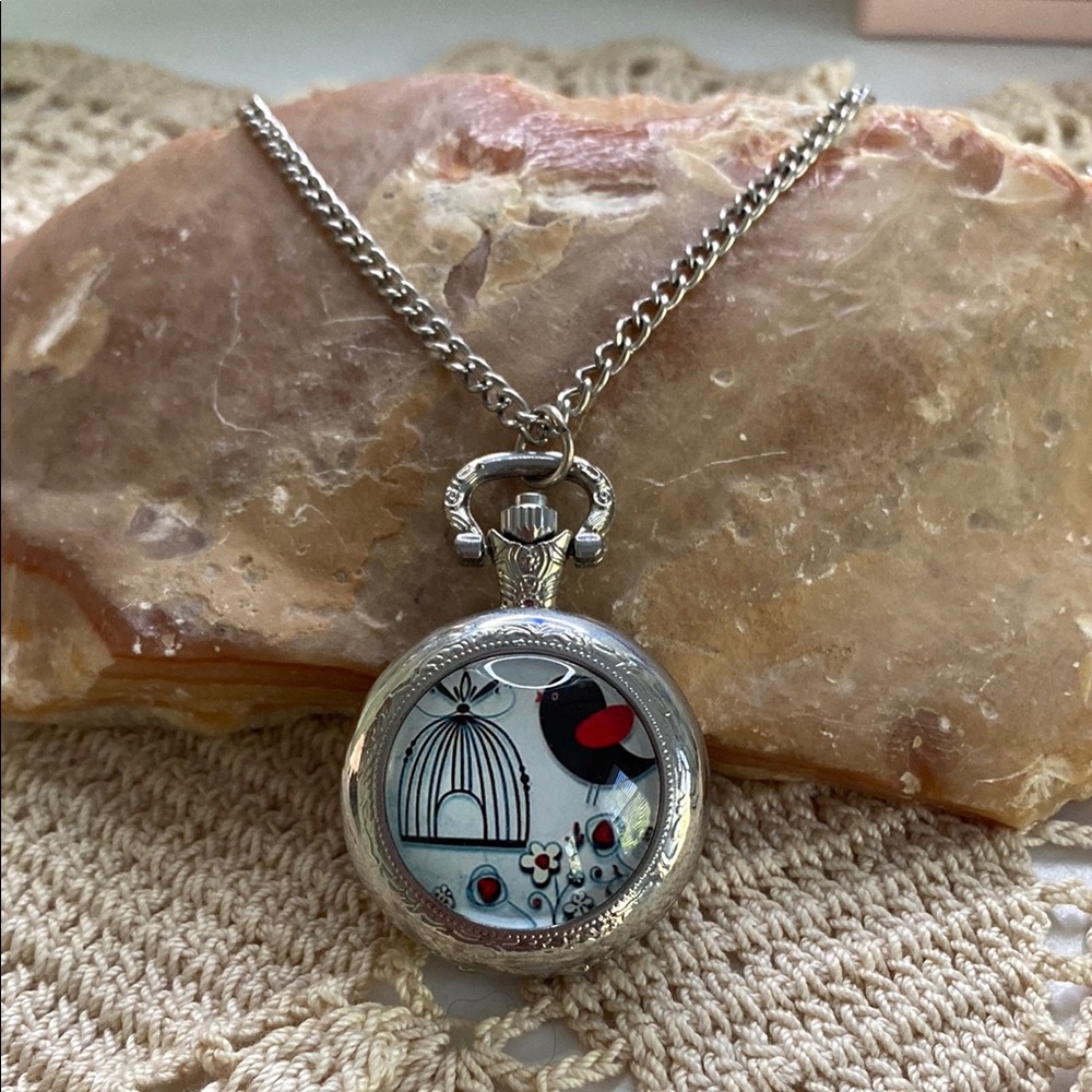 Silver Pocket Watch with Artistic Design